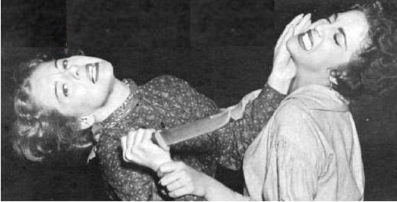 women fighting with knife